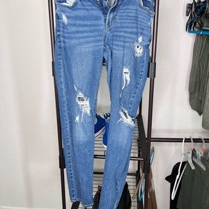 Old navy blue ripped jeans